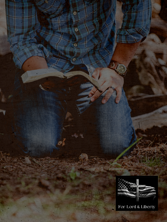 A man holding the Holy Bible with the for lord and liberty logo