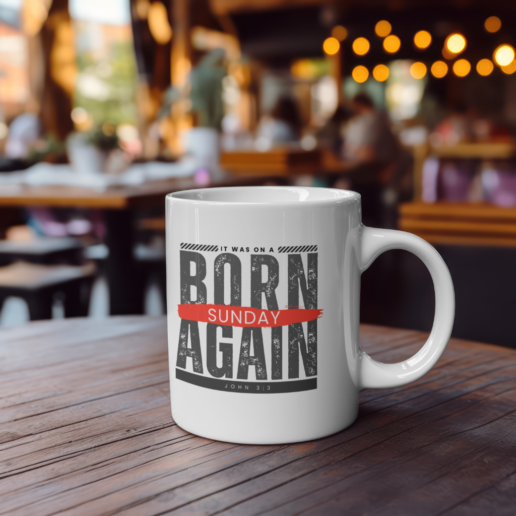 Born Again white mug on a table