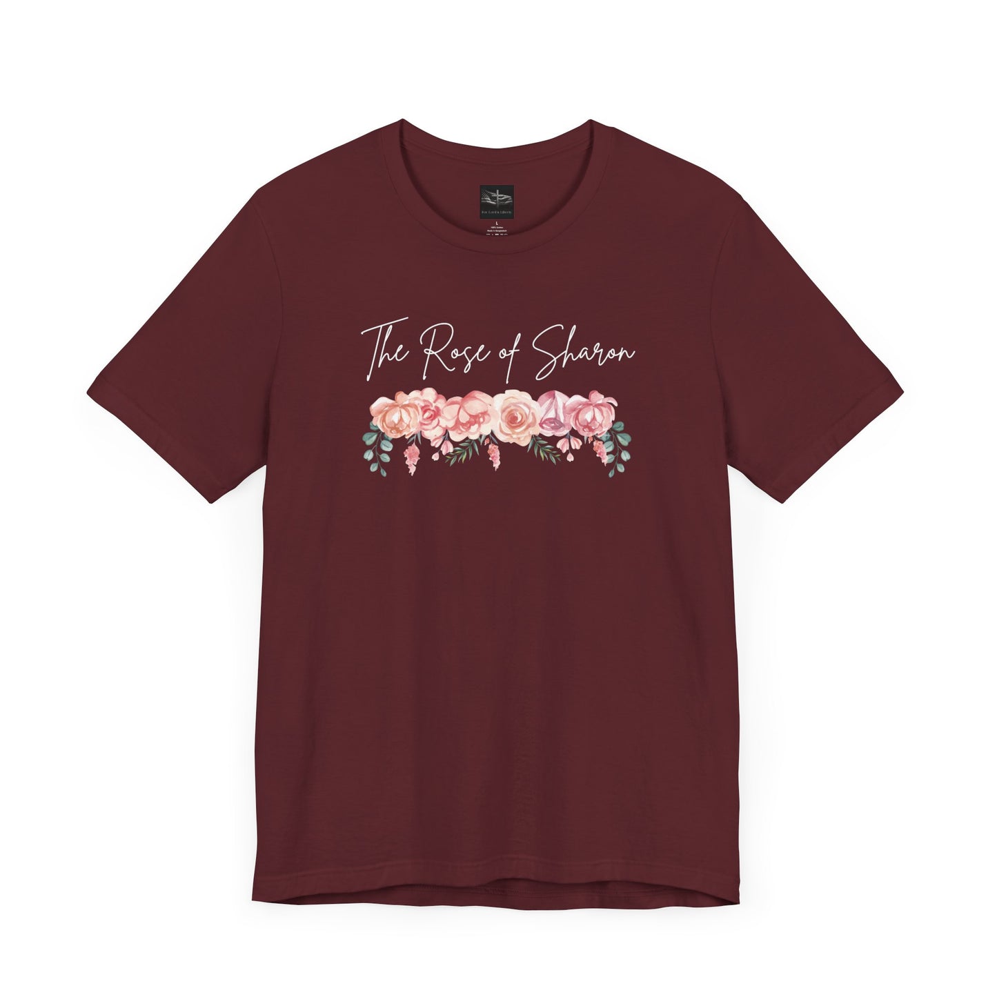 A maroon t-shirt with the words Rose of Sharon with a picture of roses