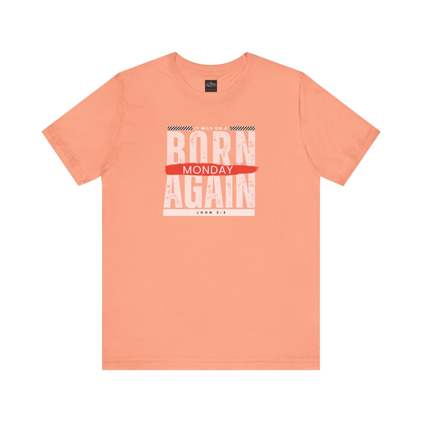 A orange t-shirt with the words Born Again it was on a Monday with the scripture John 3:3