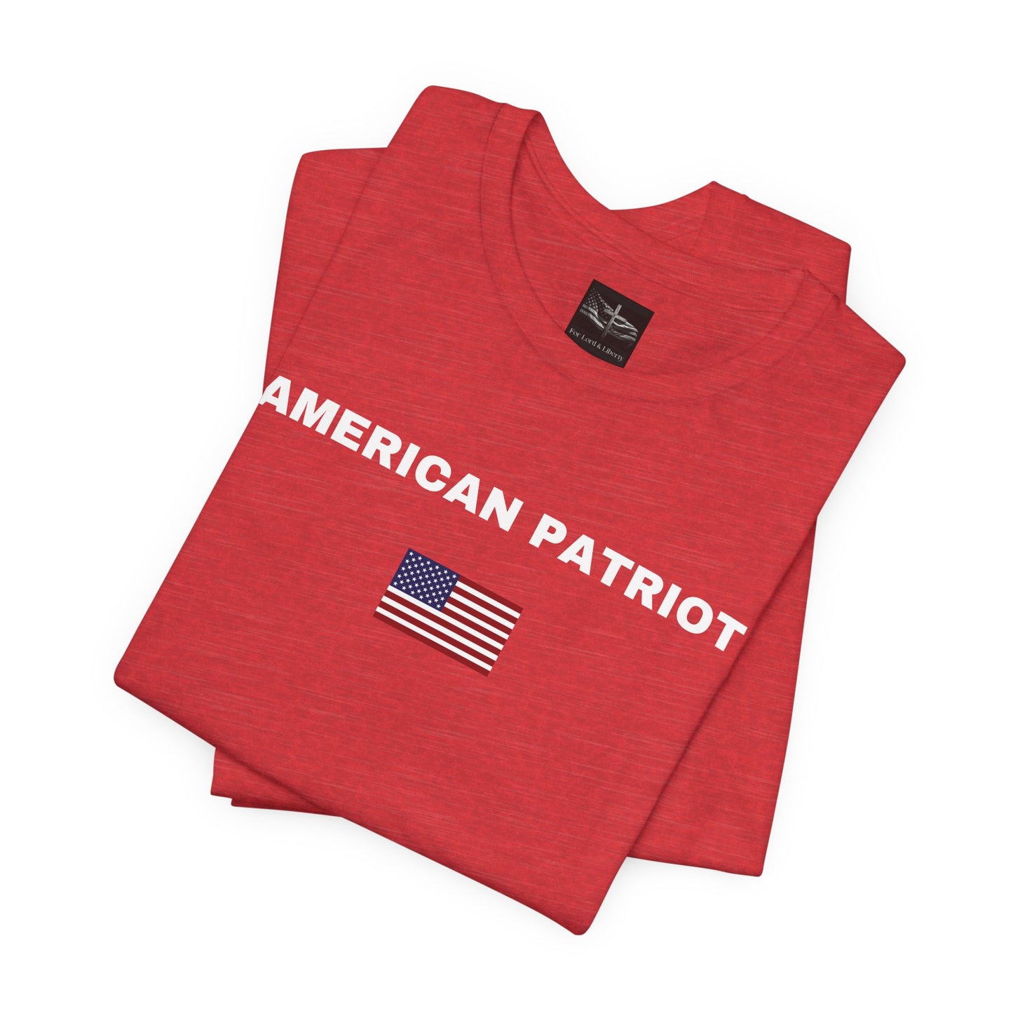 A red t-shirt with the words American Patriot in white on it with an American flag on it