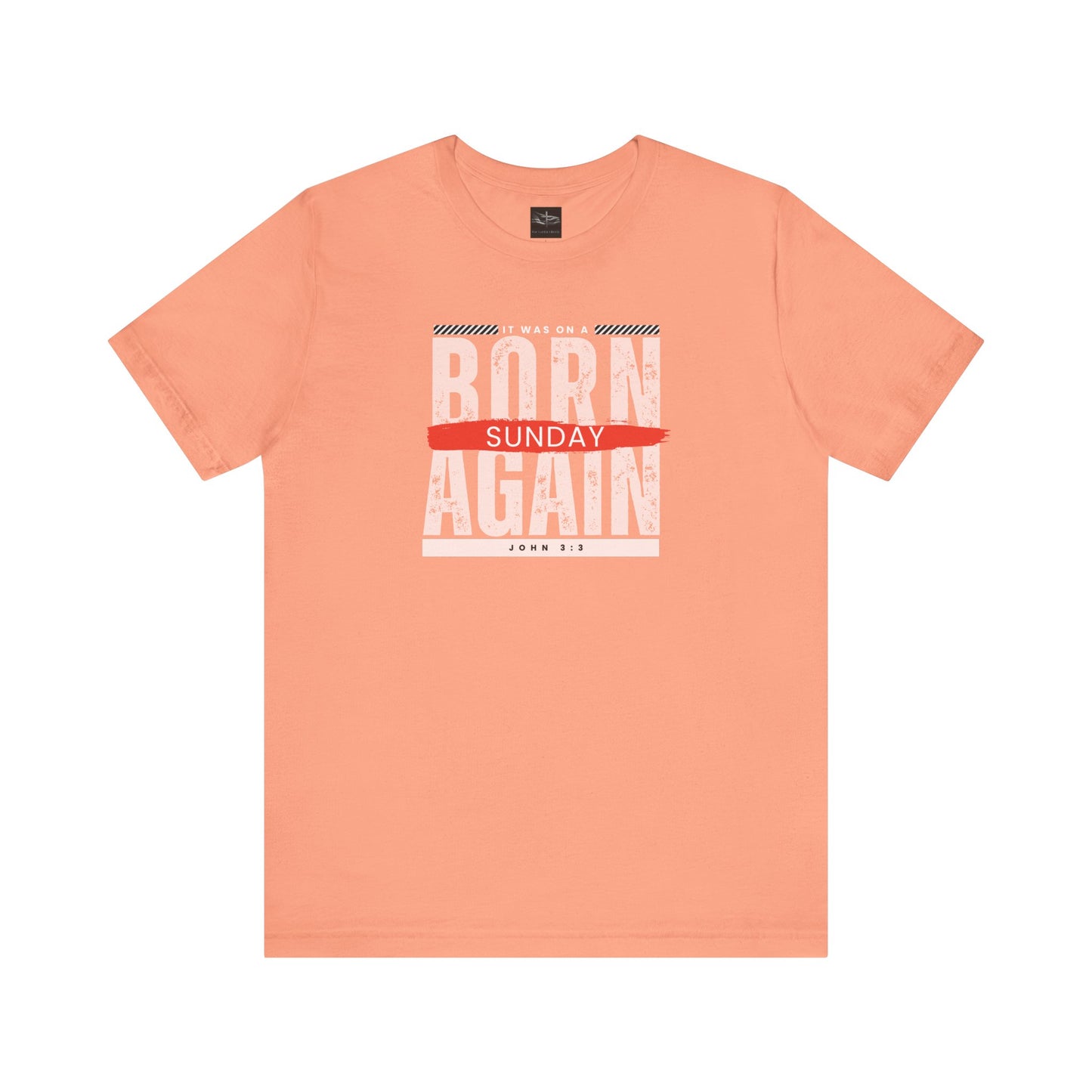 A orange t-shirt with the words Born Again it was on a Sunday with the scripture John 3:3