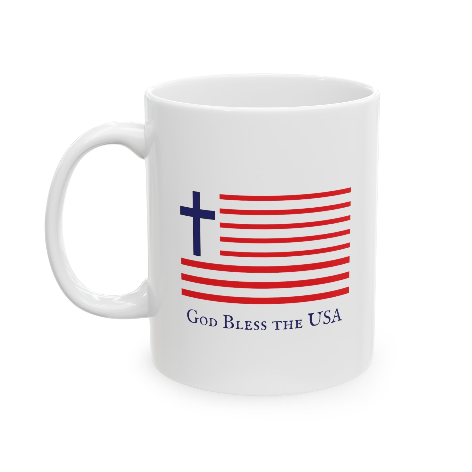 a white mug with a blue cross and an American flag with the words God Bless the USA