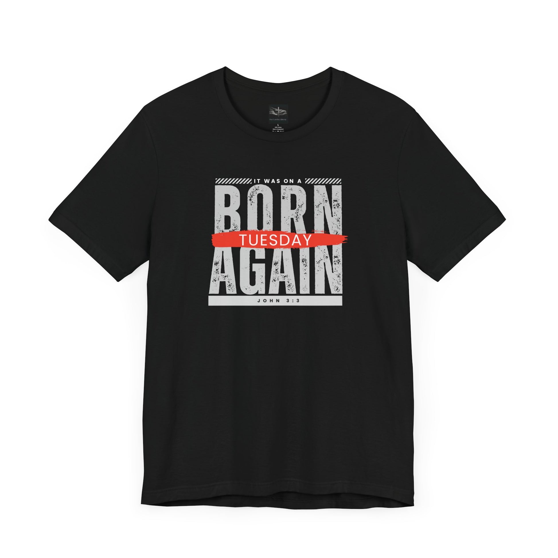 A black t-shirt with the words Born Again it was on a Tuesday with the scripture John 3:3