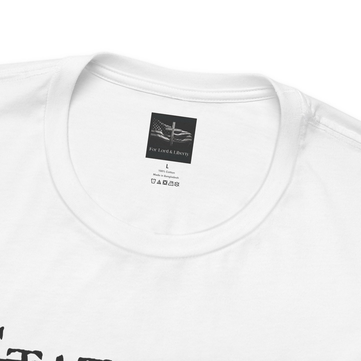 A white t-shirt with a for lord and liberty t-shirt tag