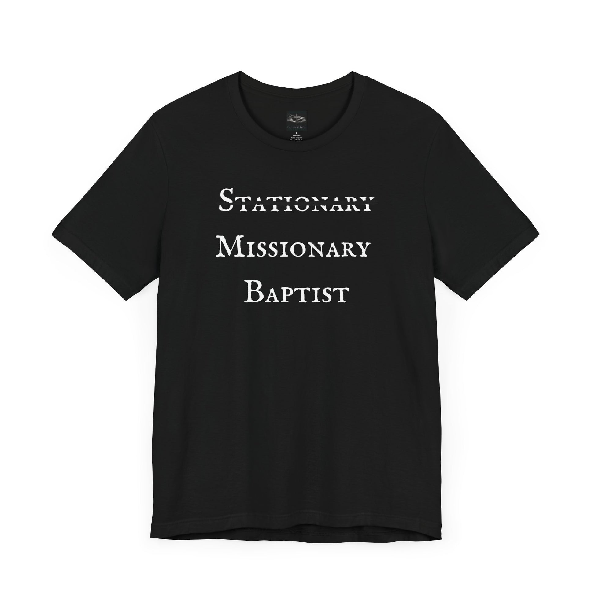 A black t-shirt with the word Stationary marked out with the words Missionary Baptist in bold