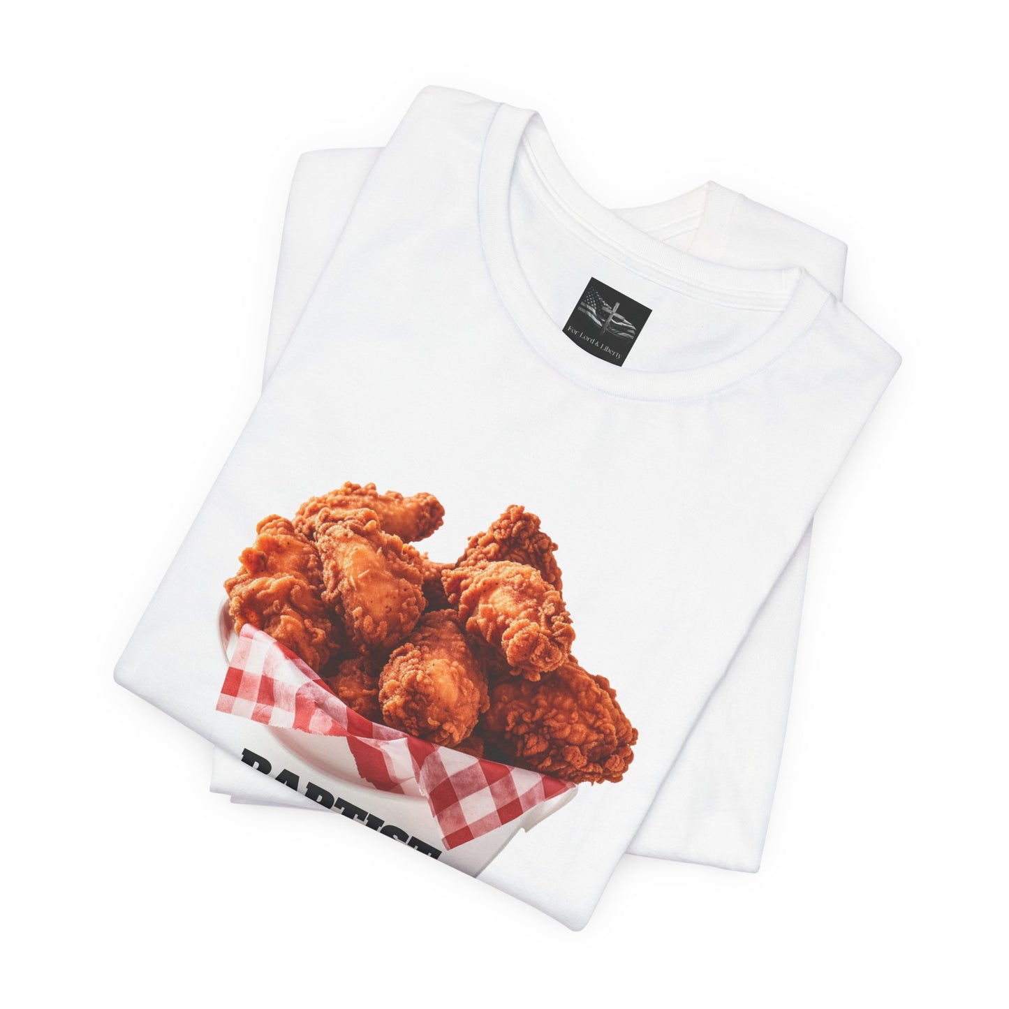 A white t-shirt with a bucket of fried chicken that says Baptist Lunch