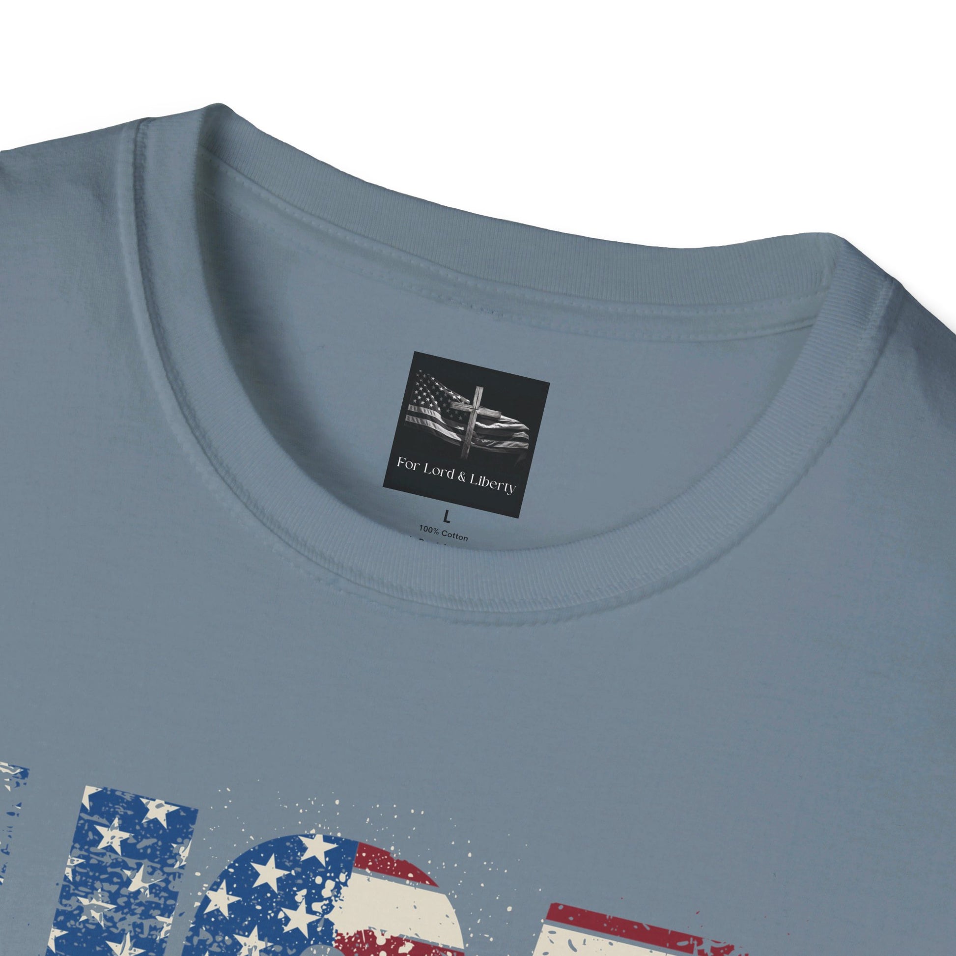 A stone blue t-shirt with the words USA God Bless America with for lord and liberty logo sizing tag