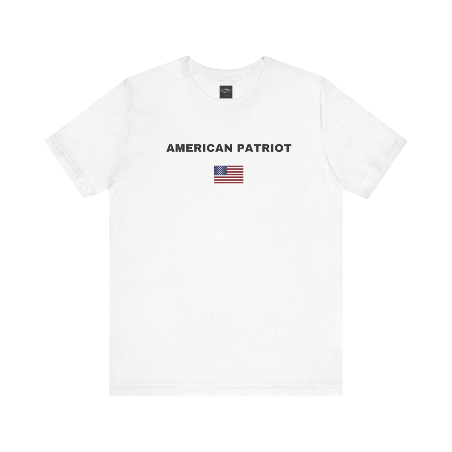 A white t-shirt with the words American Patriot in black letters and an American flag