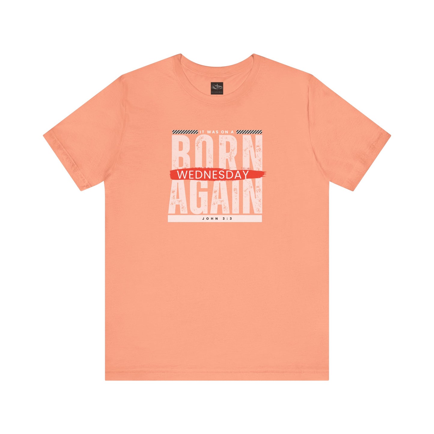 A orange t-shirt with the words Born Again it was on a Wednesday with the scripture John 3:3