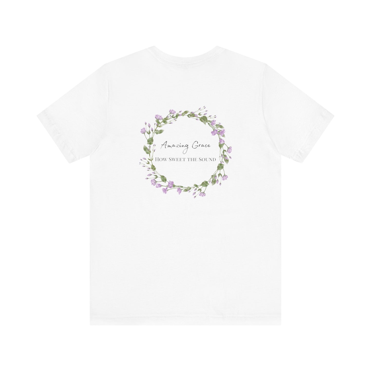 A white t-shirt with the words Amazing Grace how sweet the sound on the back of a t-shirt surrounded by a flower wreath