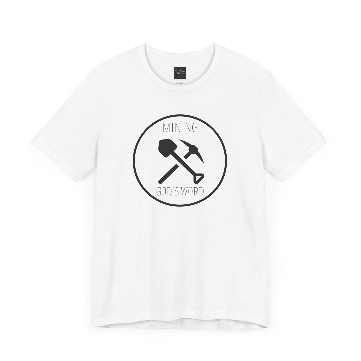 A white t-shirt with the words Mining God's Word with a picture of a shovel and pick axe