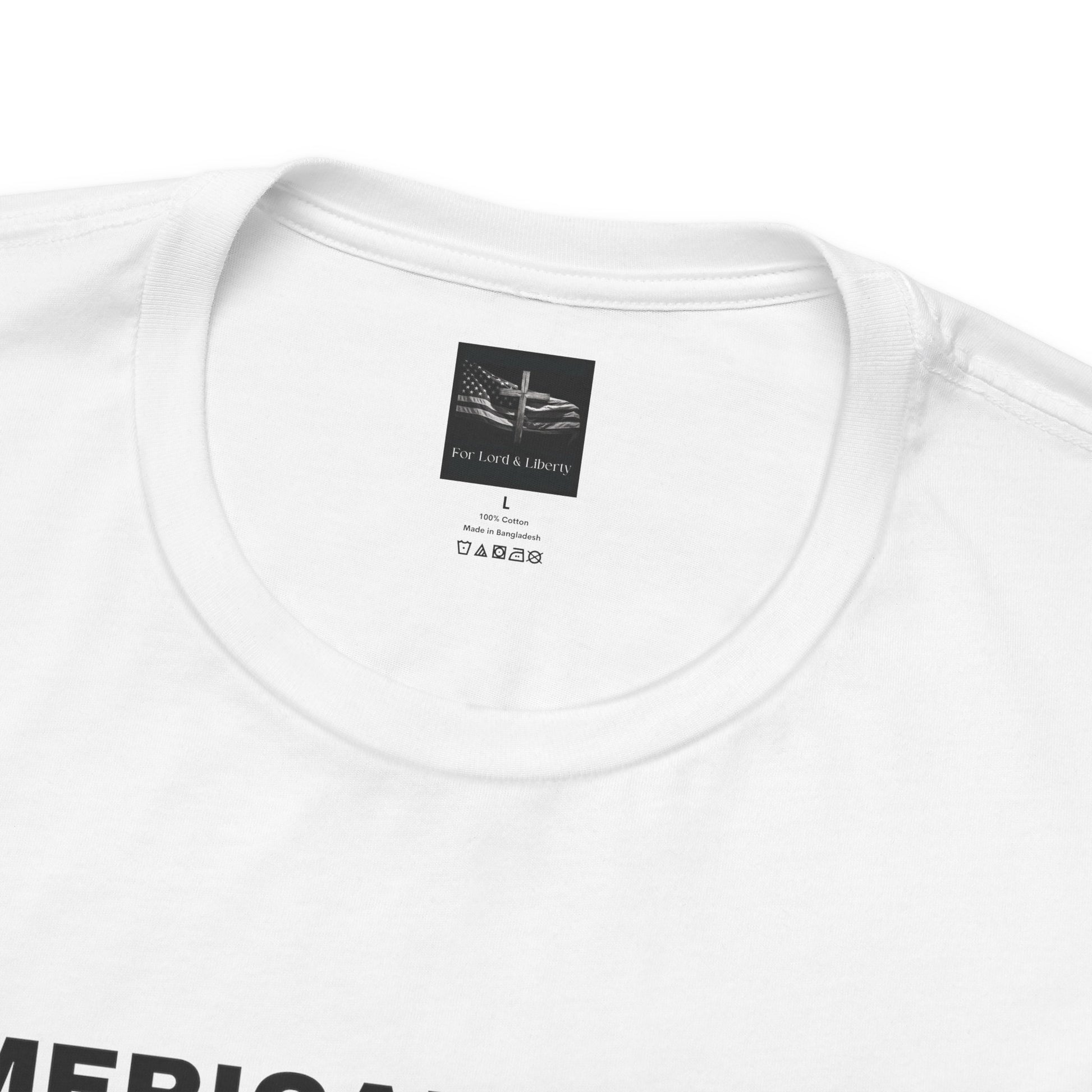 A white t-shirt with a for lord and liberty t-shirt tag