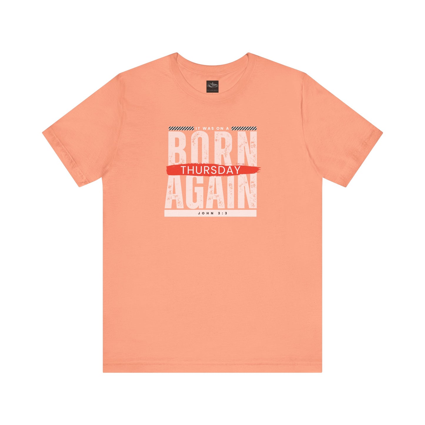 A orange t-shirt with the words Born Again it was on a Thursday with the scripture John 3:3