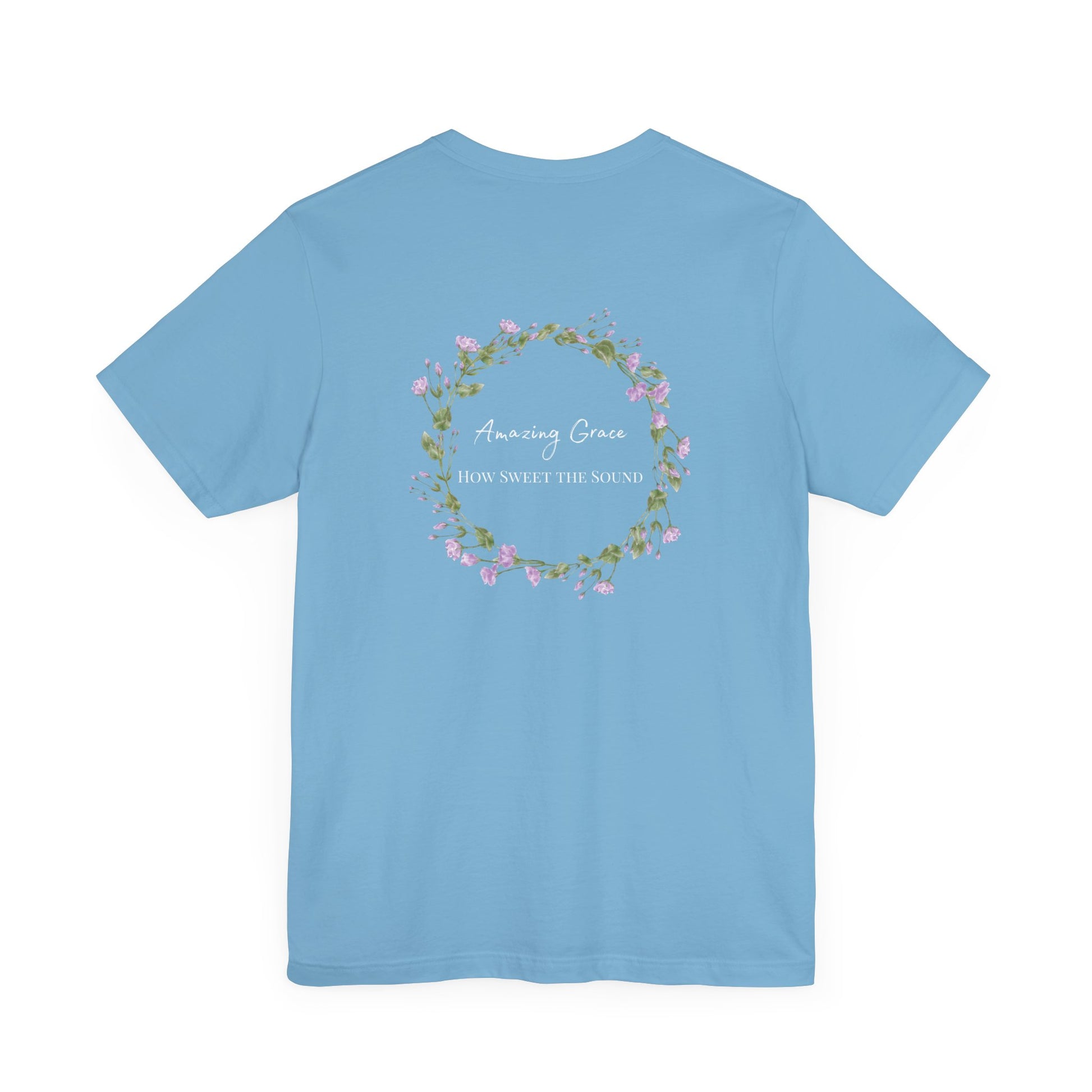 Blue t-shirt with the words Amazing Grace How Sweet the Sound with a flower wreath around the words 