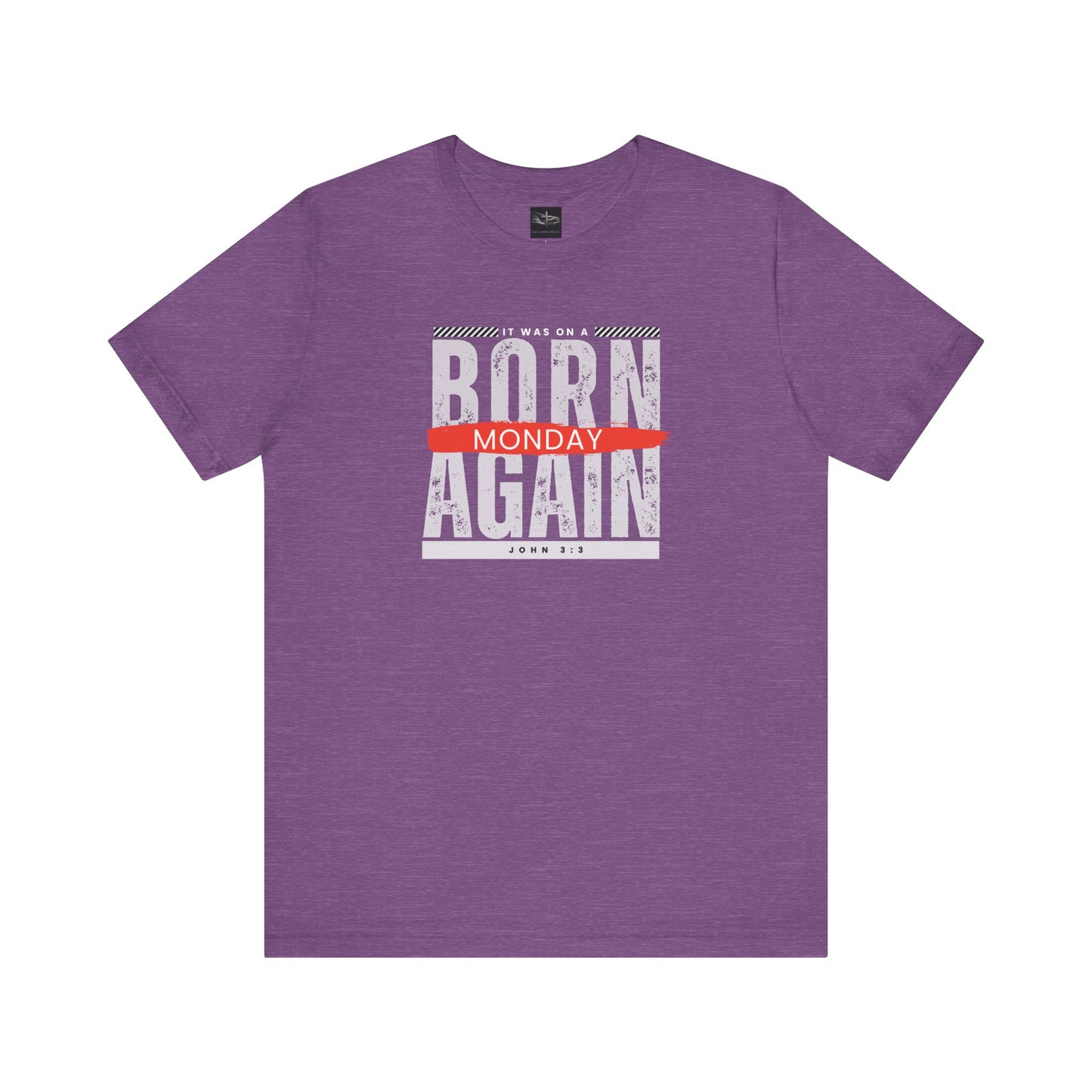 A purple t-shirt with the words Born Again it was on a Monday with the scripture John 3:3