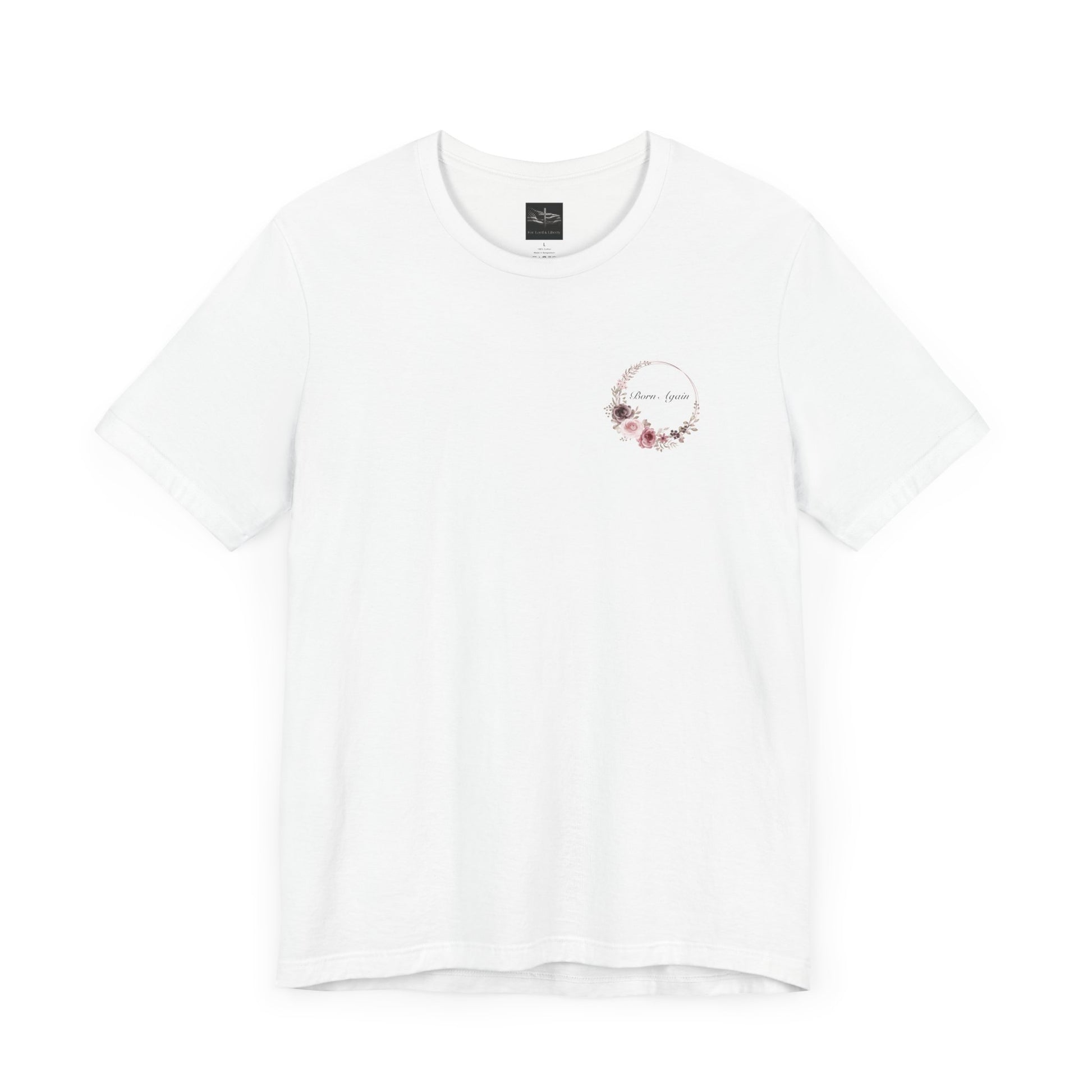 A white t-shirt with the words Born Again with a flower wreath on the front left pocket