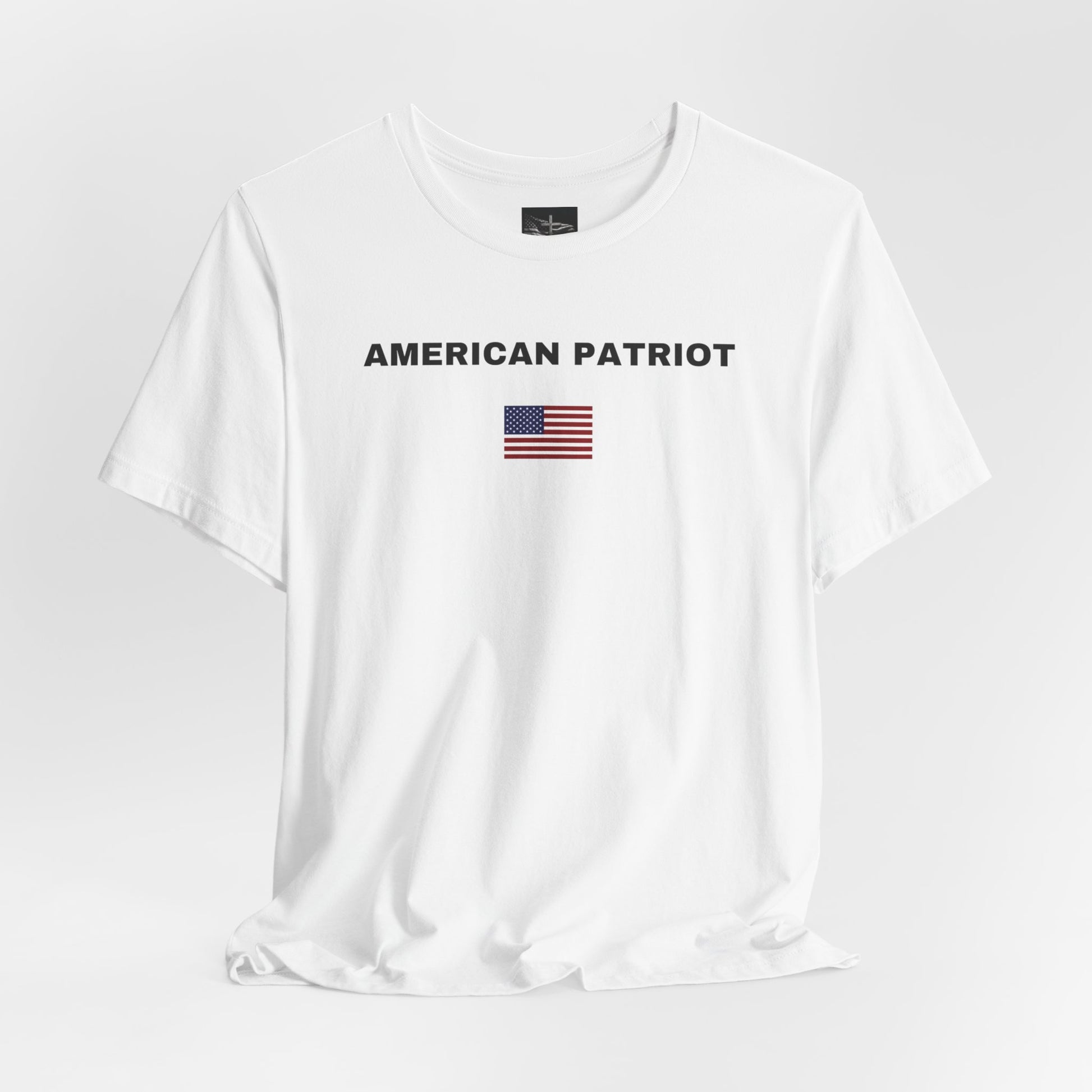 white t-shirt with the words American Patriot on it with an American flag