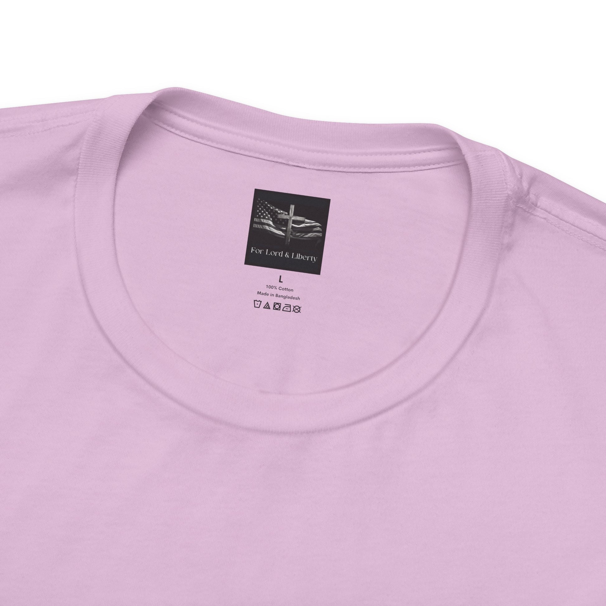 A lilac t-shirt with a for lord and liberty t-shirt  tag