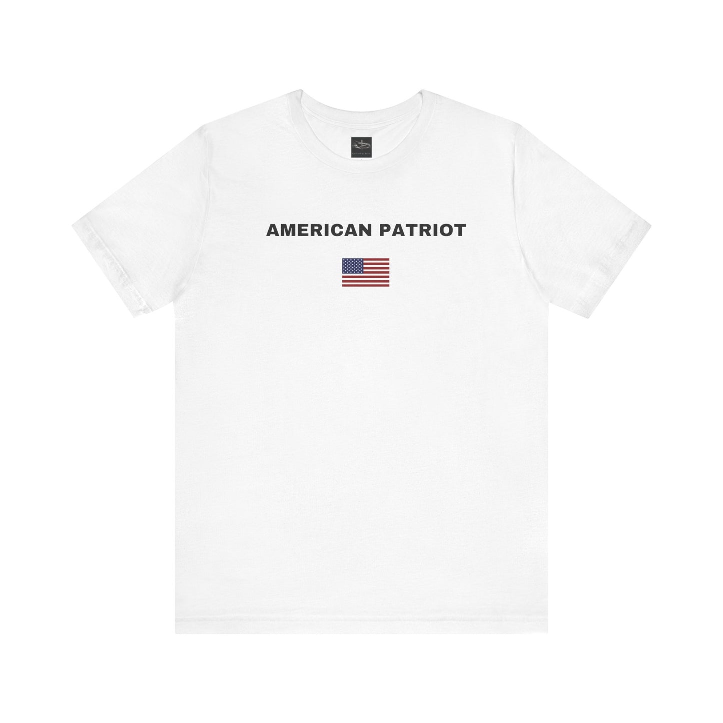 A white t-shirt with the words American Patriot in white with an American flag