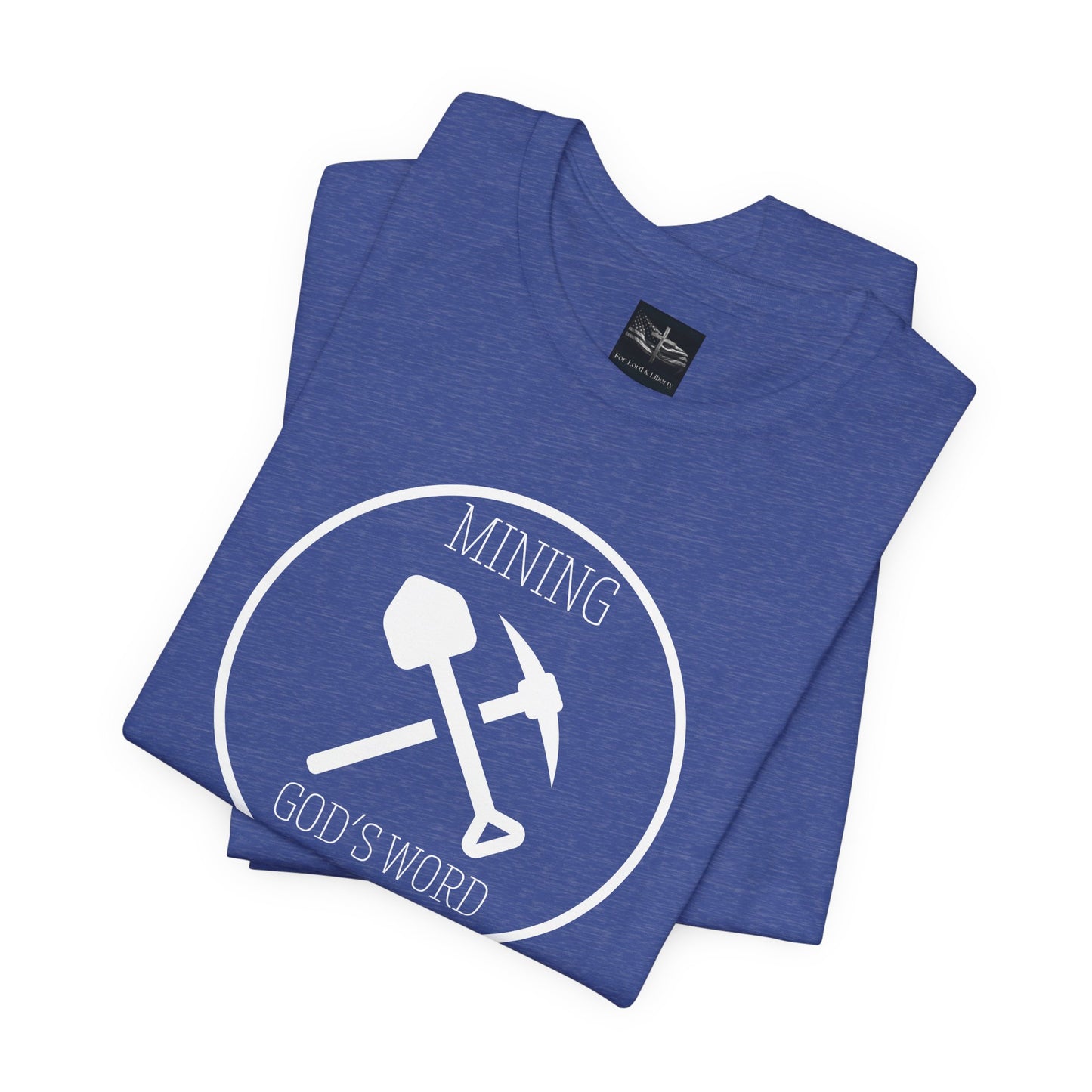 A heather true royal t-shirt with the words Mining God's Word with a picture of a shovel and pick axe