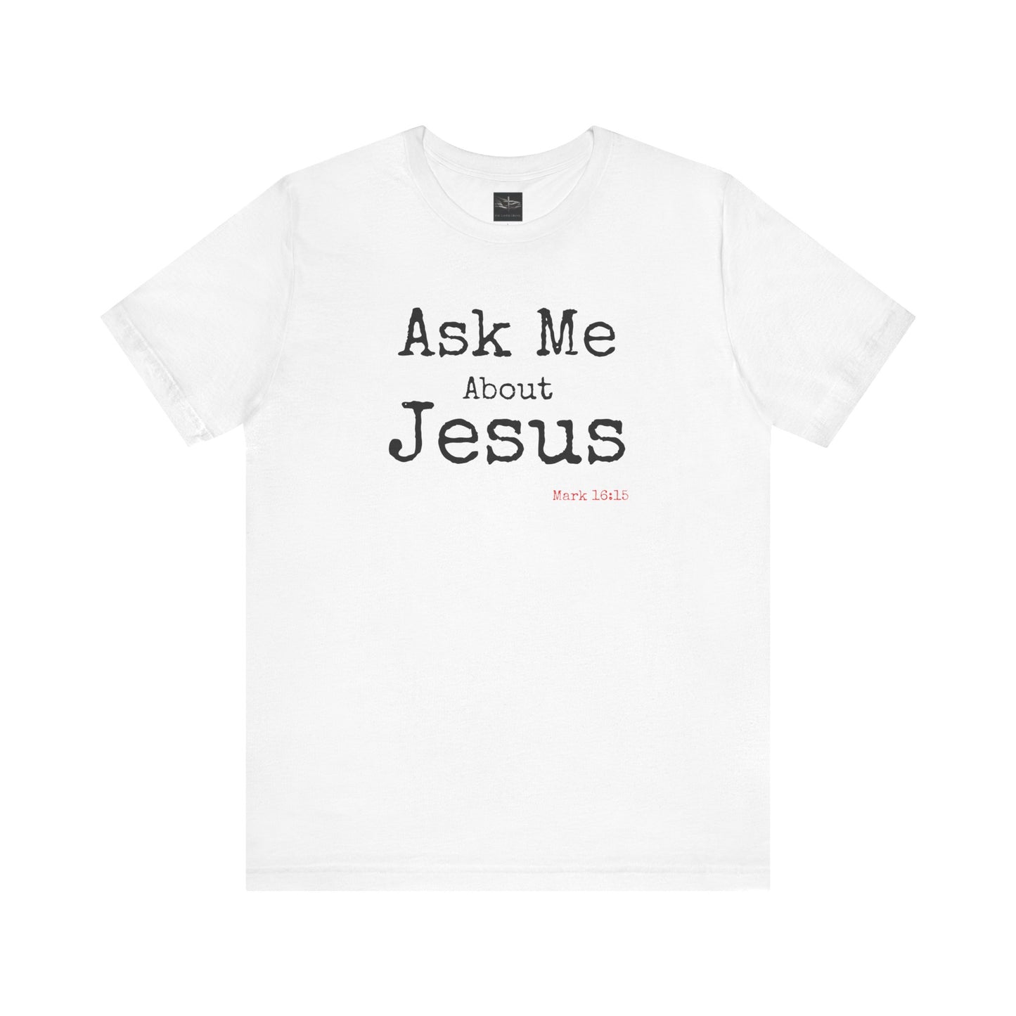 A white t-shirt with the words Ask Me About Jesus with Scripture Mark 16:15