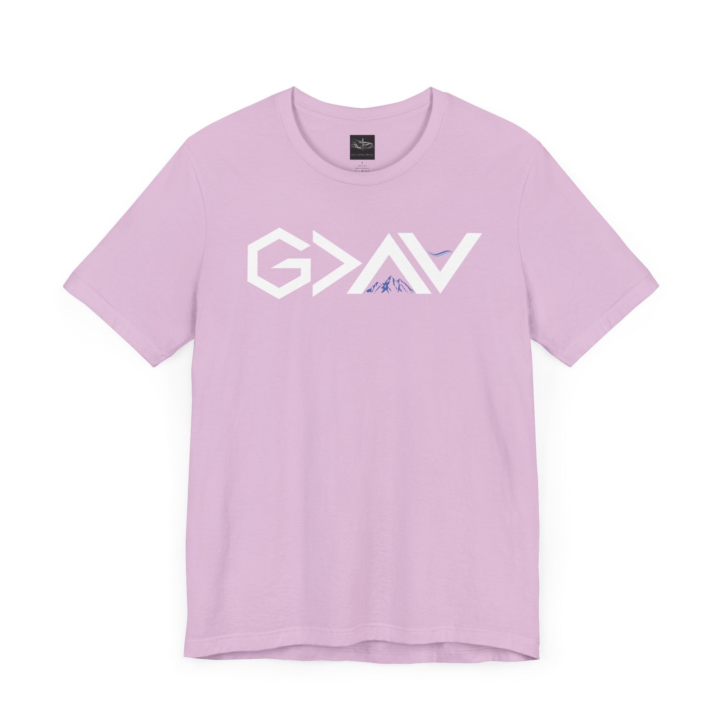 A lilac t-shirt with the words God is Greater than the Mountains and Valleys