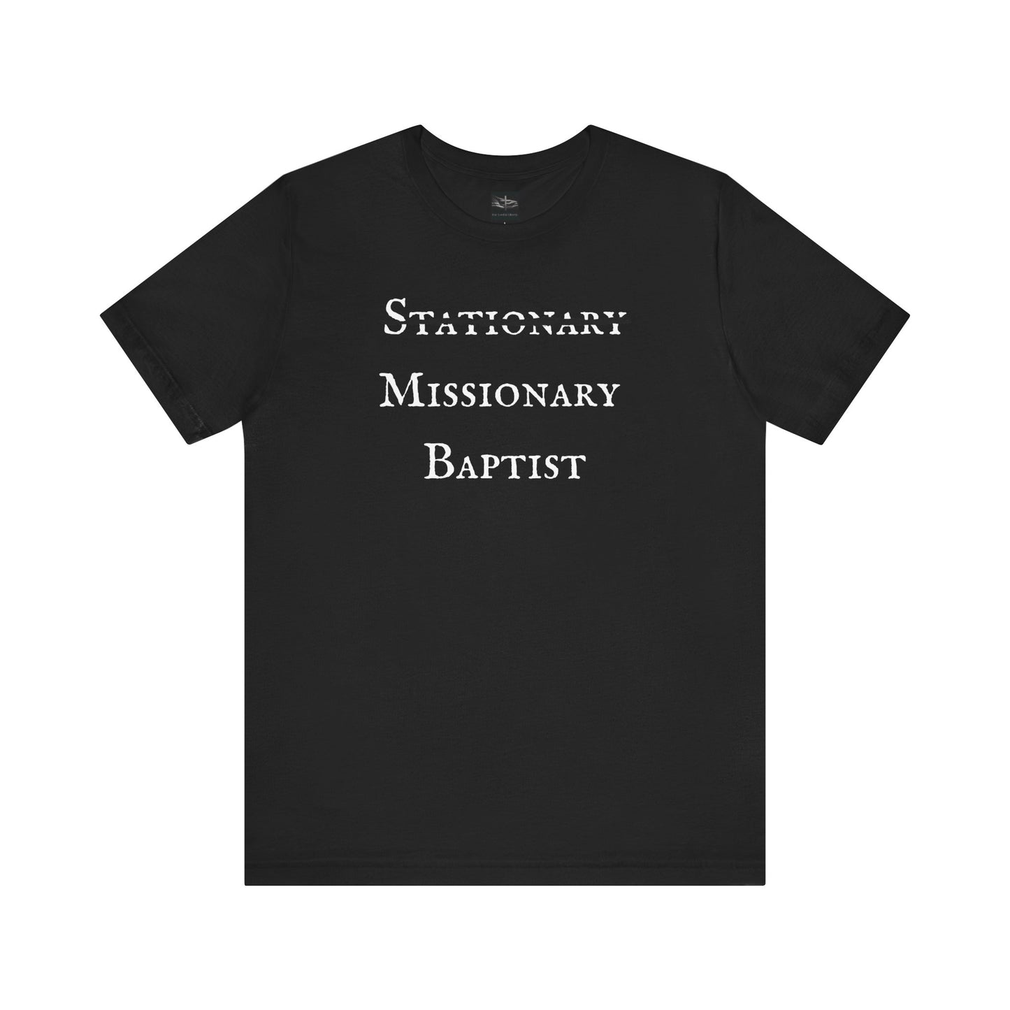 A black t-shirt with the word Stationary marked out with the words Missionary Baptist in bold