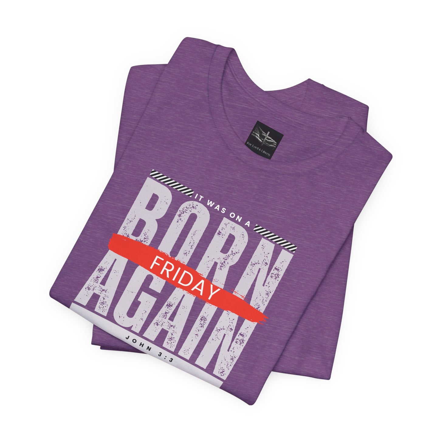 A purple t-shirt with the words Born Again it was on a Friday with the scripture John 3:3