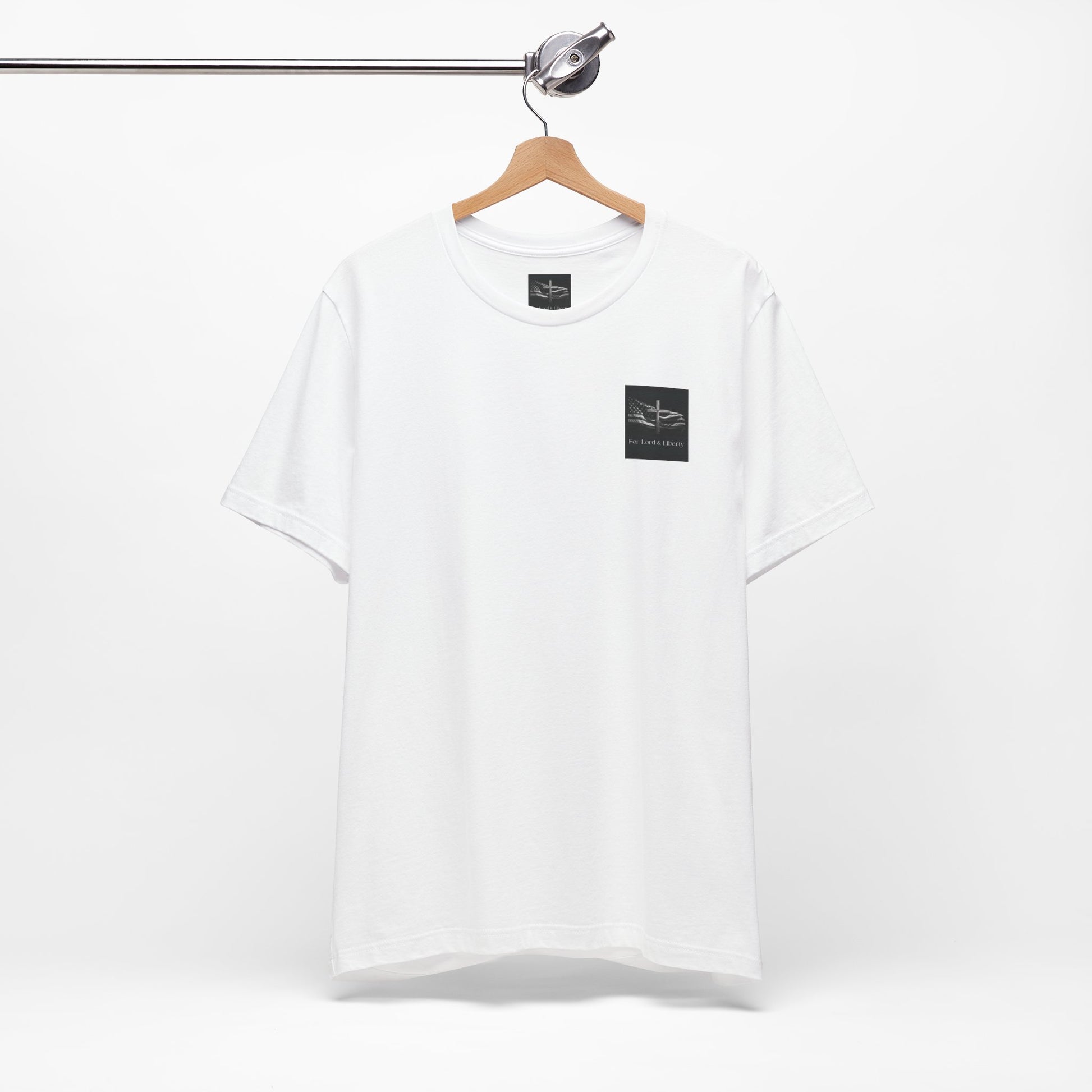 A white t-shirt with the For Lord & Liberty logo on the front left pocket