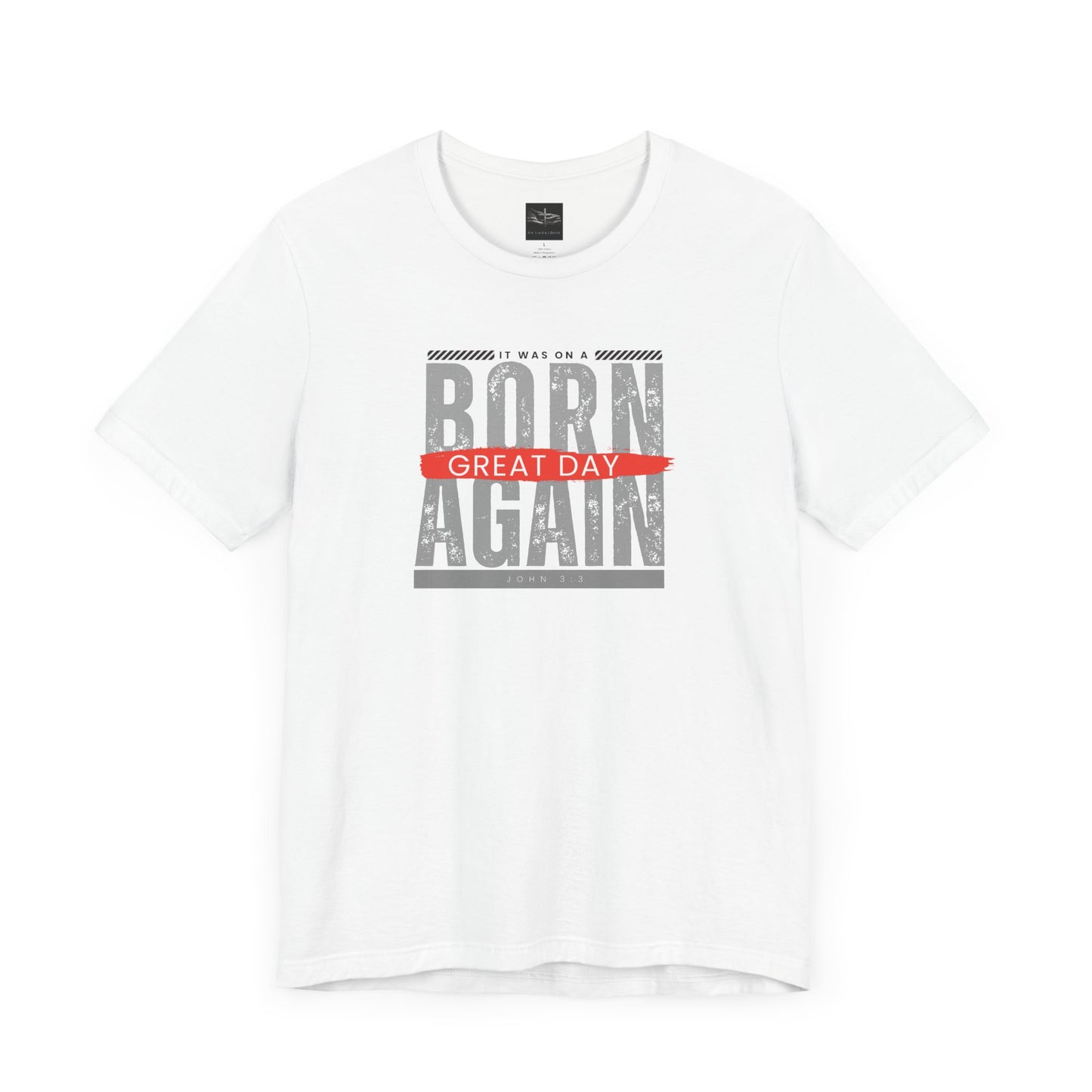 A white t-shirt with the words Born Again it was on a Great Day with the scripture John 3:3