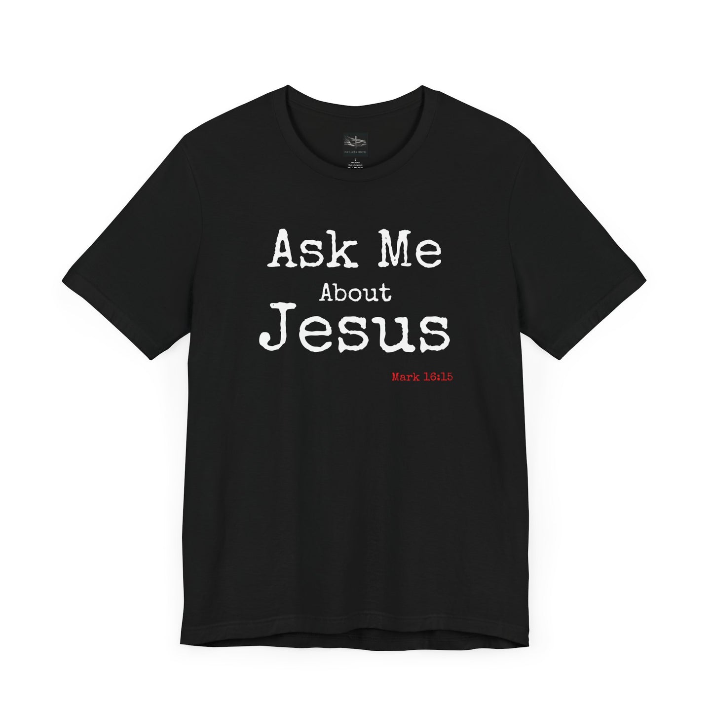 A black t-shirt with the words Ask Me About Jesus with Scripture Mark 16:15