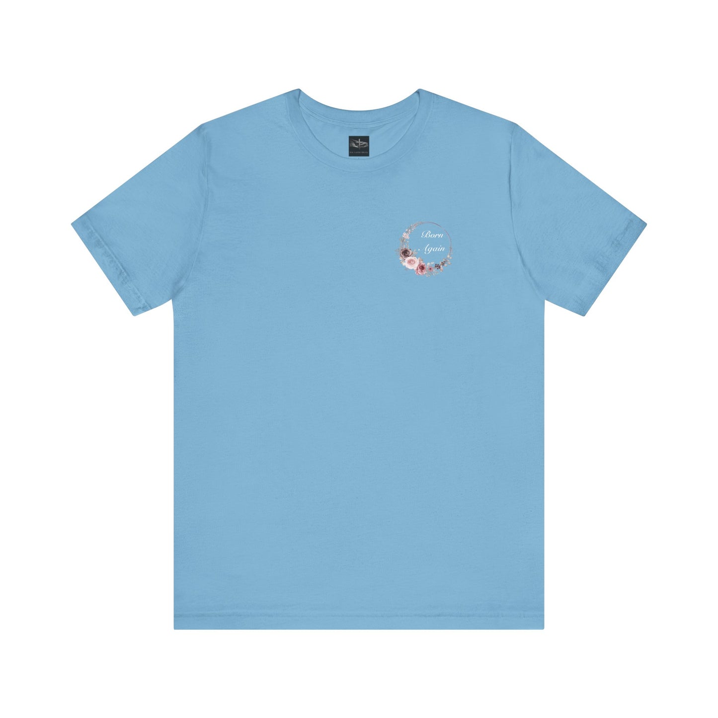 A ocean blue t-shirt with the words Born Again with a flower wreath on the front left pocket