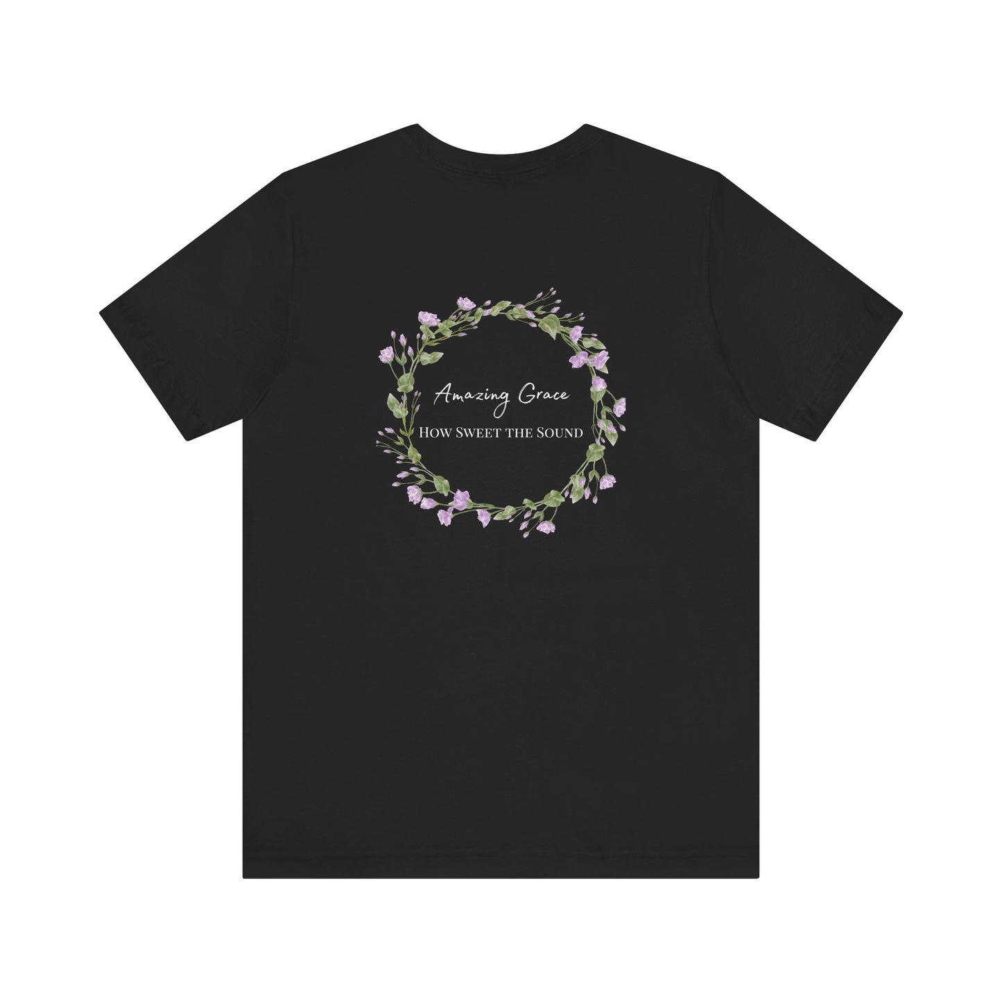 A black t-shirt with the words Amazing Grace how sweet the sound on the back of a t-shirt surrounded by a flower wreath