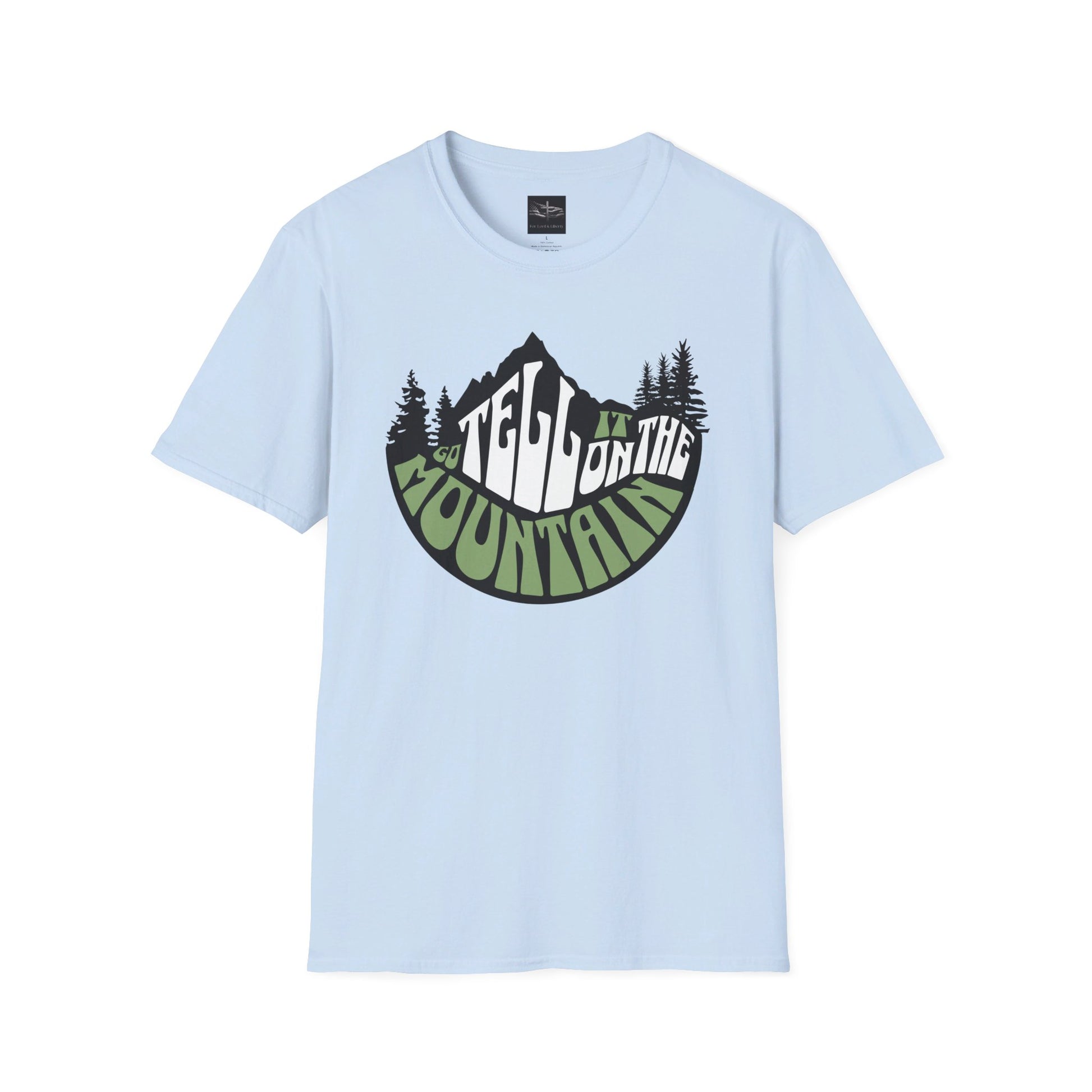 A light blue t-shirt with the words Go Tell it on the Mountain with the for lord and liberty size tag