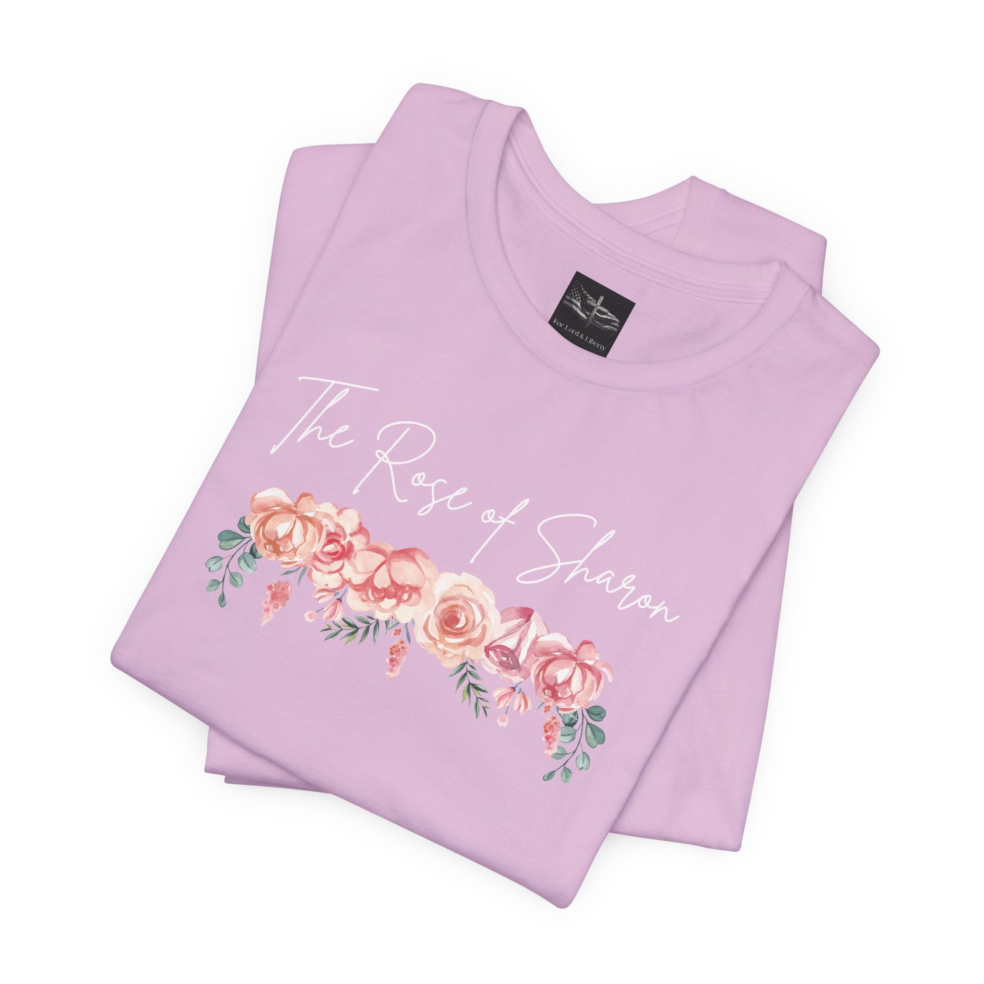 A lilac t-shirt with the words Rose of Sharon with a picture of roses