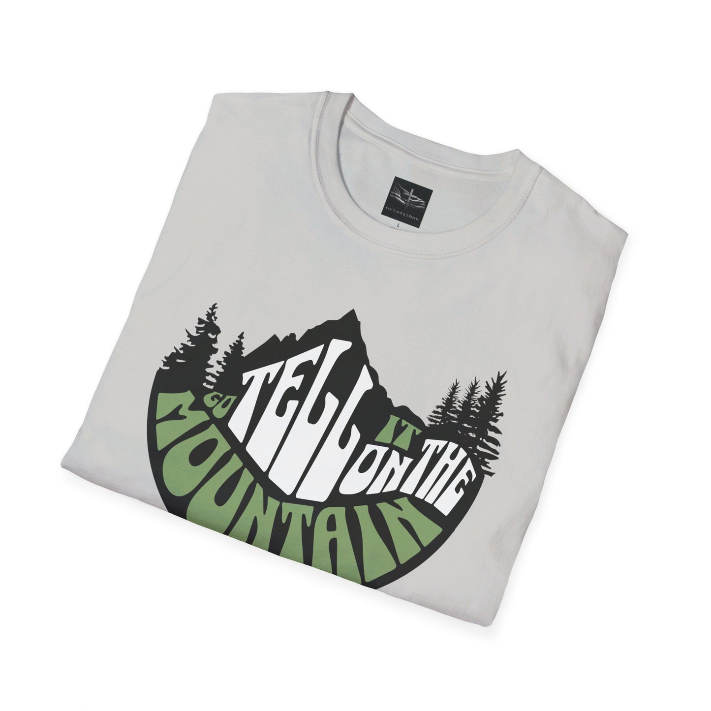 An ice gray t-shirt with the words Go Tell it on the Mountain with the for lord and liberty size tag folded