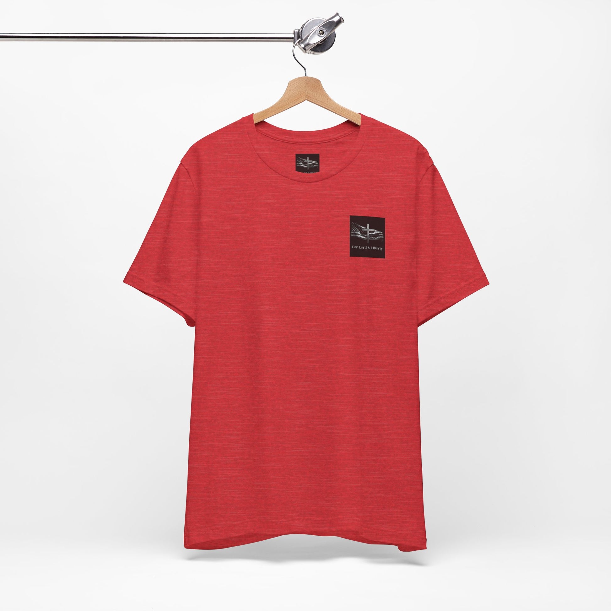 A red t-shirt with the for lord and liberty logo on the left pocket