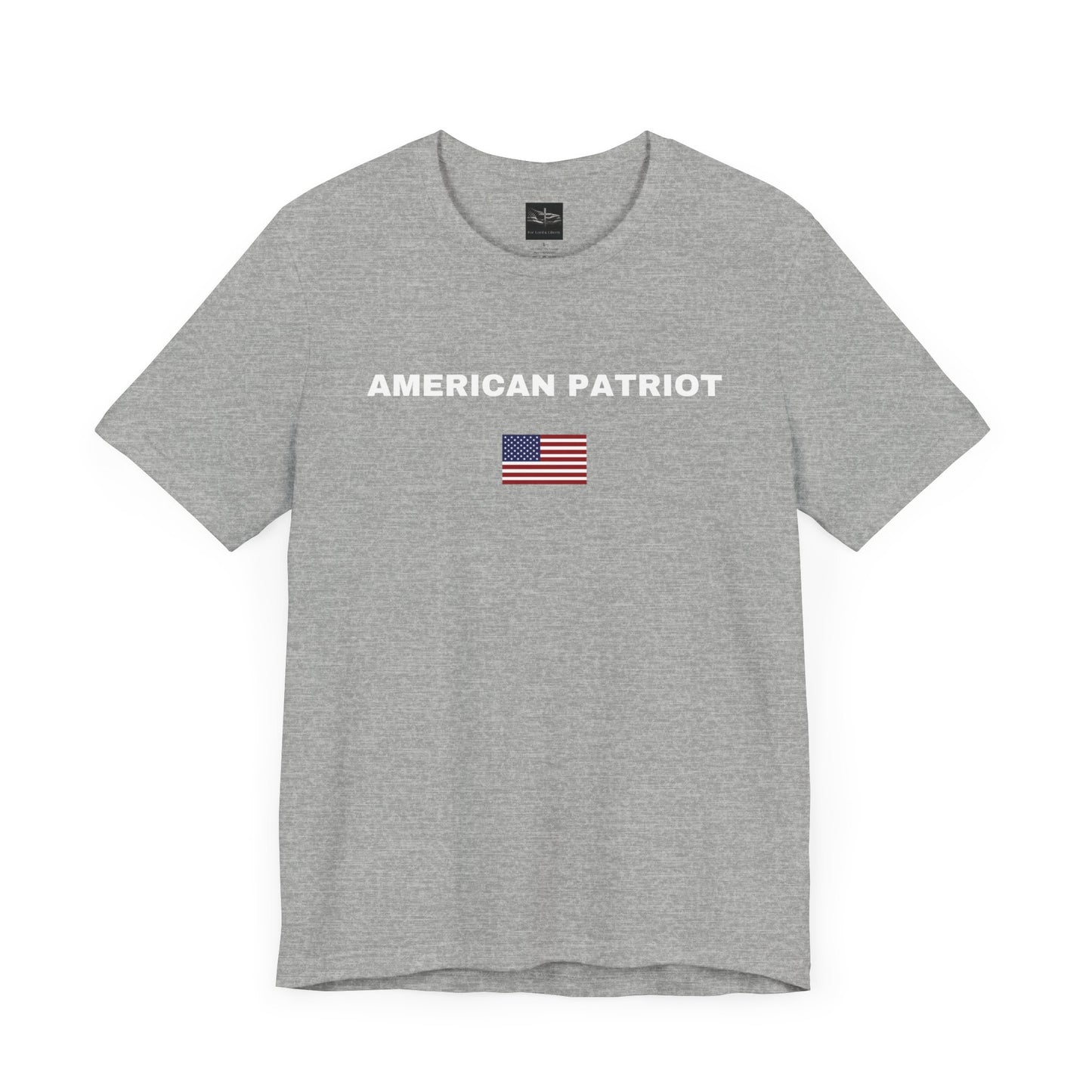 A athletic heather gray t-shirt with the words American Patriot in white letters and an American flag