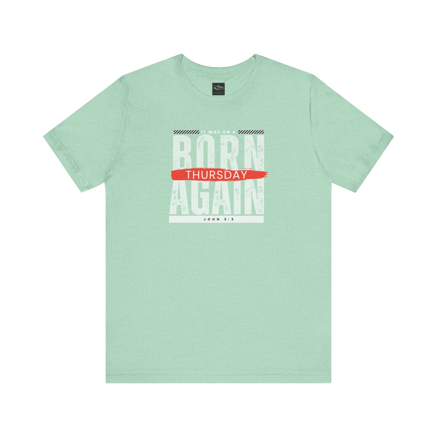 A green t-shirt with the words Born Again it was on a Thursday with the scripture John 3:3