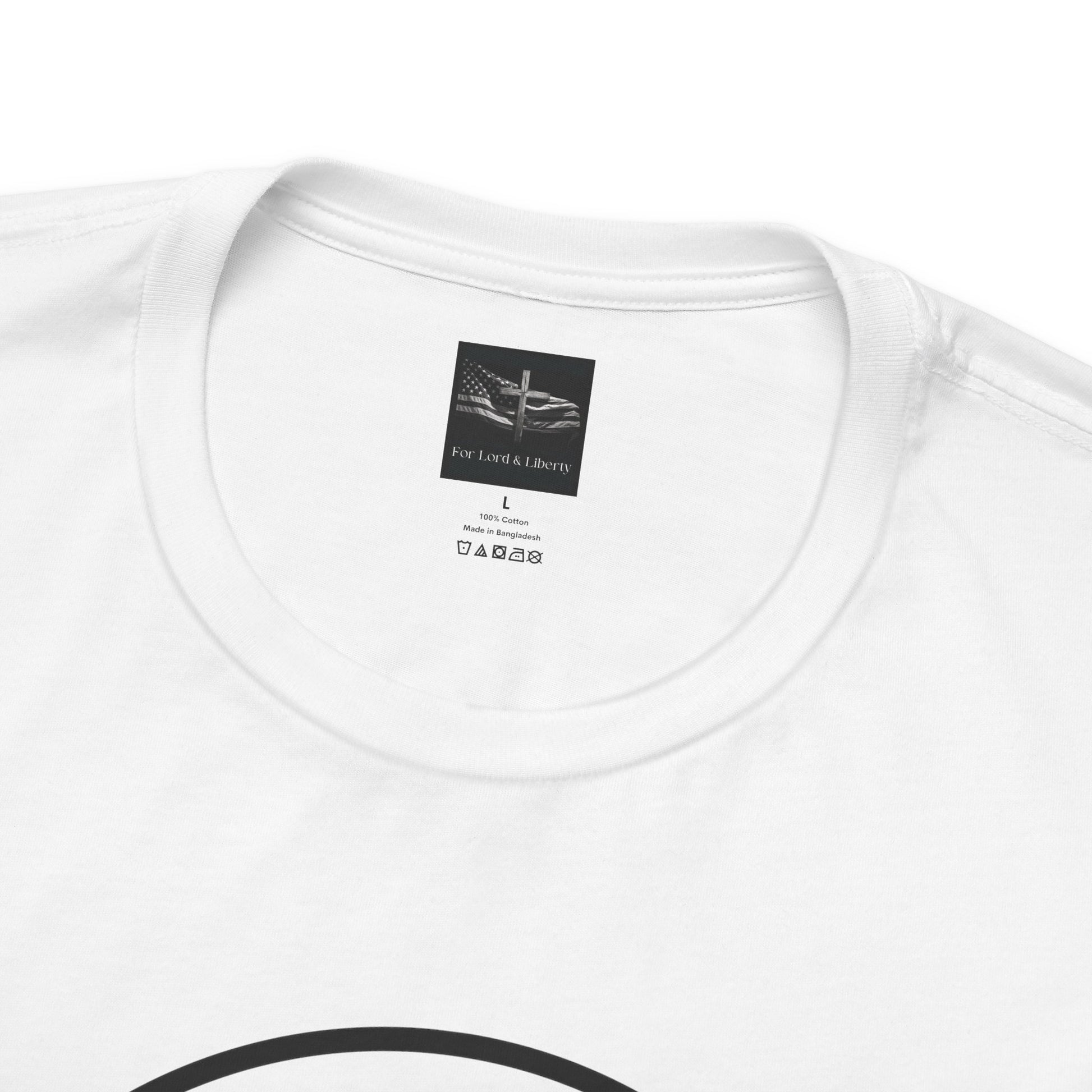 A white t-shirt with a for lord and liberty t-shirt tag