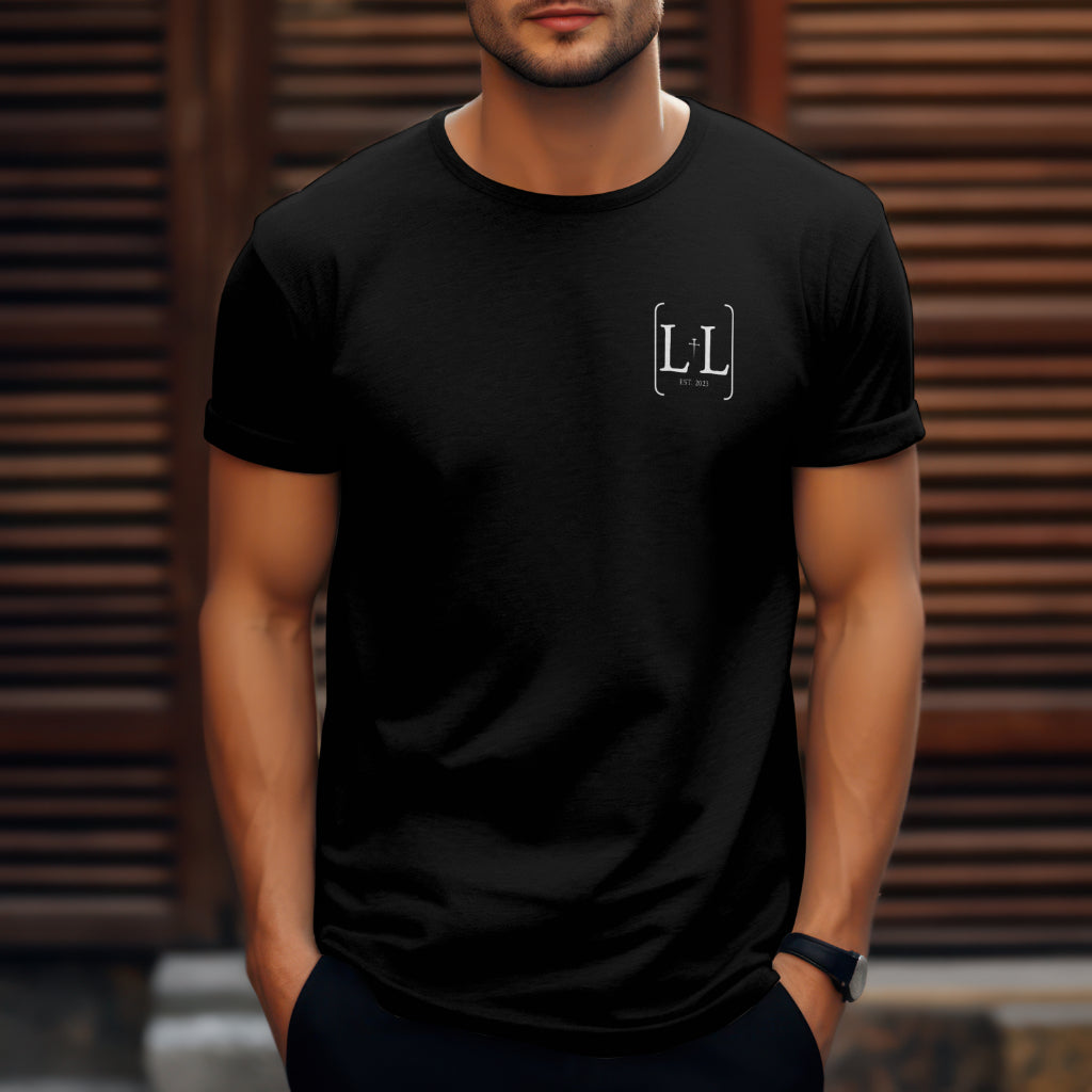 a male wearing a black t-shirt with the for lord and liberty logo