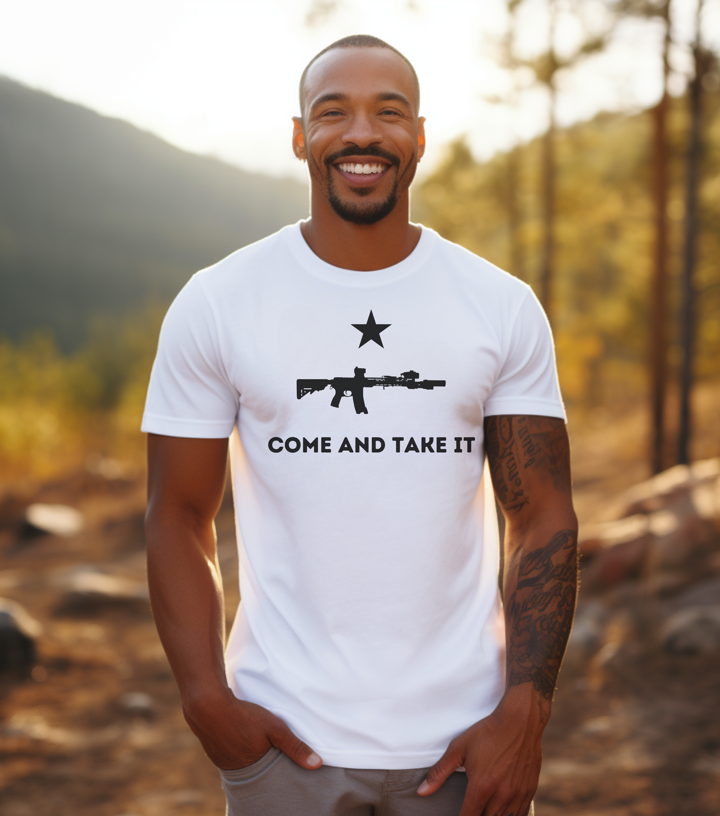 A black male with a white t-shirt with the words Come And Take It