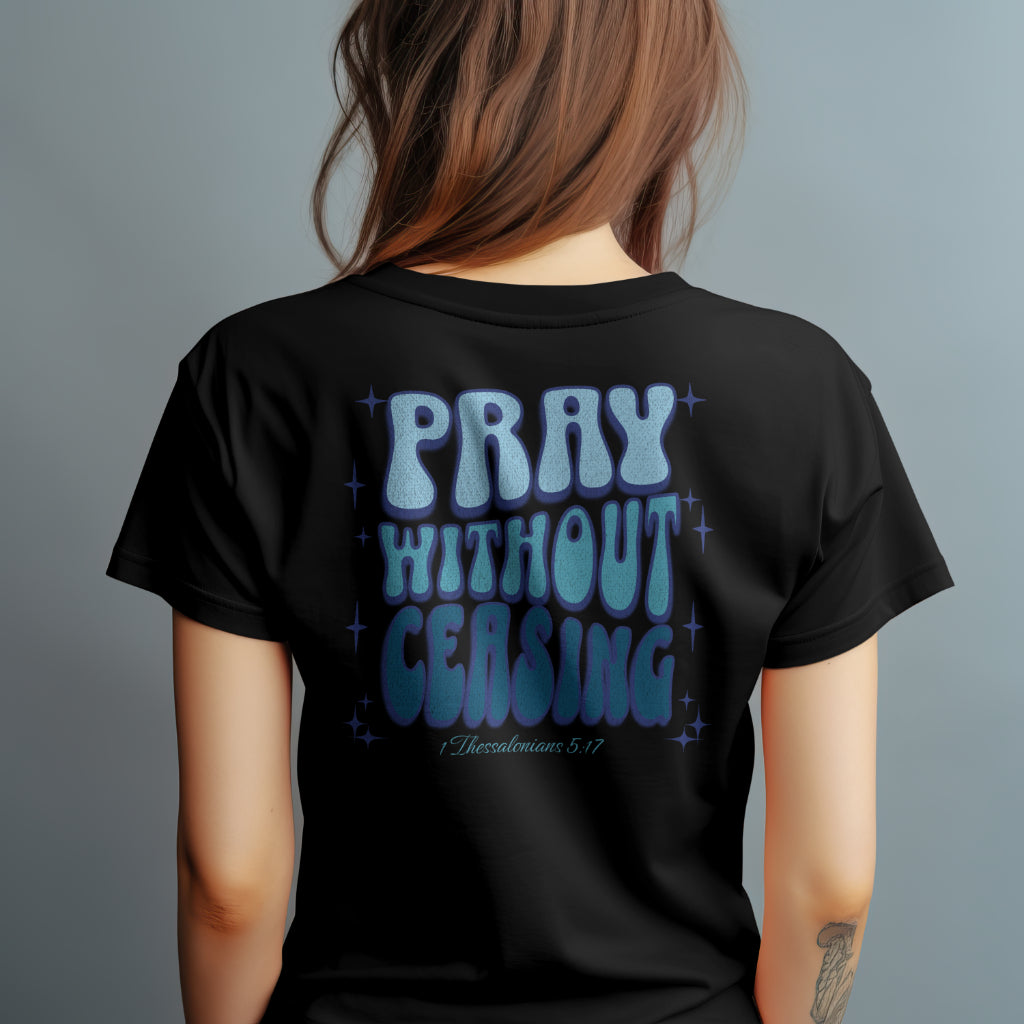 a woman wearing a black t-shirt with the words pray without ceasing 1 Thessalonians 5:17